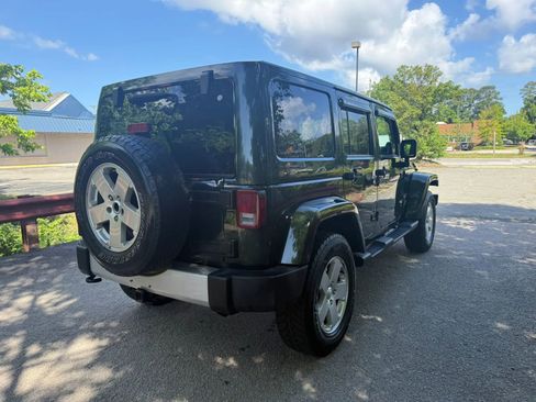 Used 2012 Jeep Wrangler Unlimited Sahara w/ Dual Top Group AWD/4WD image 6