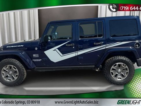 Used 2013 Jeep Wrangler Unlimited Rubicon w/ Dual Top Group AWD/4WD image 2