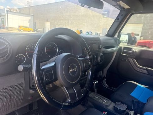 Used 2012 Jeep Wrangler Unlimited Sport AWD/4WD image 9