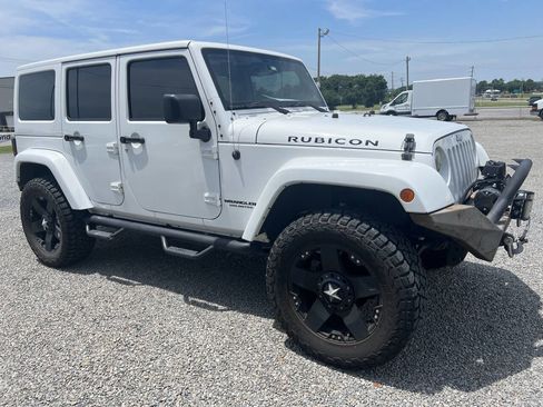 Used 2014 Jeep Wrangler Unlimited Rubicon w/ Connectivity Group AWD/4WD image 1