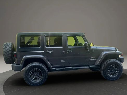 Used 2014 Jeep Wrangler Unlimited Sahara w/ Dual Top Group AWD/4WD image 4