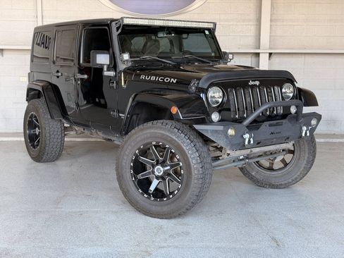 Used 2014 Jeep Wrangler Unlimited Sahara AWD/4WD image 2