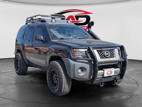 Used 2011 Nissan Xterra PRO-4X AWD/4WD image 1