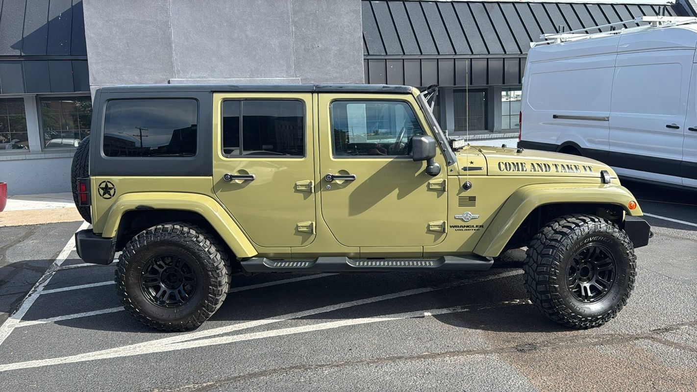 Used 2013 Jeep Wrangler Unlimited Sport AWD/4WD image 2