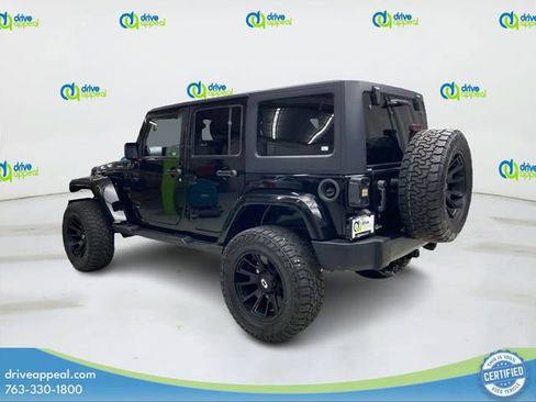 Used 2014 Jeep Wrangler Unlimited Sahara w/ Dual Top Group AWD/4WD image 8