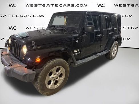 Used 2015 Jeep Wrangler Unlimited Sahara w/ Dual Top Group image 1