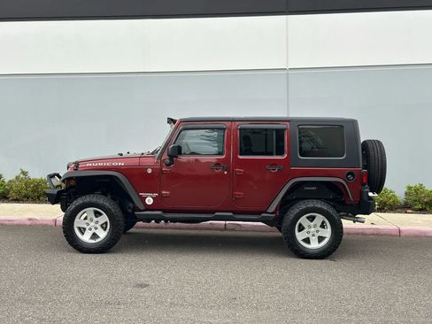 Used 2010 Jeep Wrangler Unlimited Rubicon w/ Dual Top Group image 2