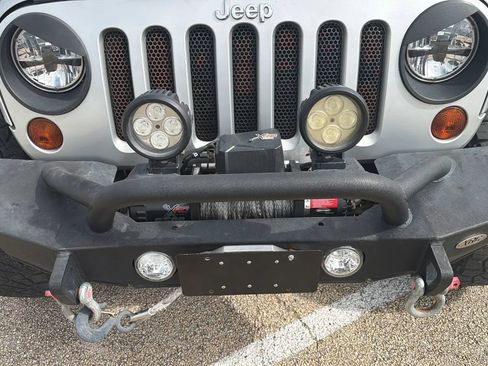 Used 2012 Jeep Wrangler Unlimited Sahara w/ Dual Top Group AWD/4WD image 9