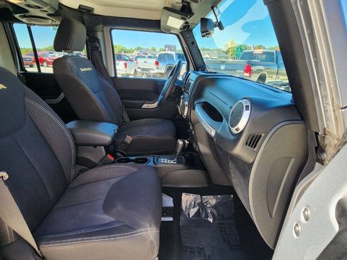 Used 2013 Jeep Wrangler Unlimited Sahara w/ Dual Top Group AWD/4WD image 16