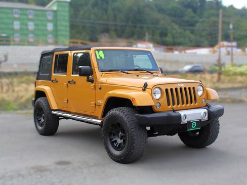Used 2014 Jeep Wrangler Unlimited Sahara w/ Dual Top Group image 1