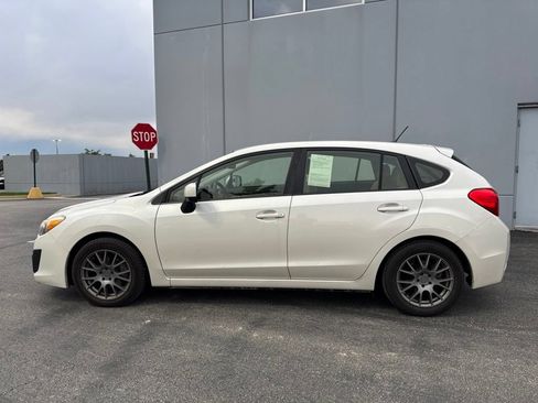 Used 2014 Subaru Impreza 2.0i Premium w/ All-Weather Package w/CVT AWD/4WD image 1