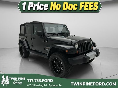 Used 2013 Jeep Wrangler Unlimited Sahara AWD/4WD image 1