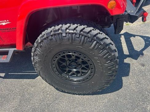 Used 2014 Jeep Wrangler Unlimited Sahara w/ Mopar Chrome Edition Group AWD/4WD image 2