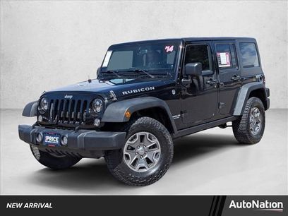 Used 2014 Jeep Wrangler Unlimited Rubicon w/ Dual Top Group