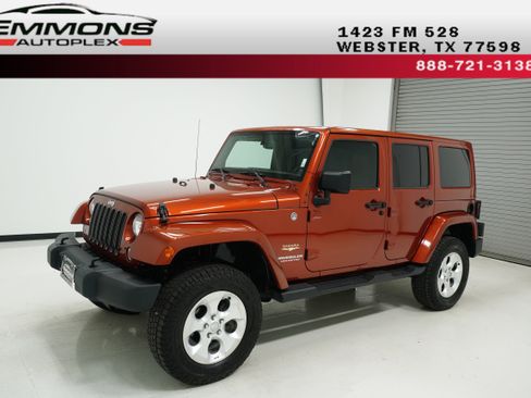 Used 2014 Jeep Wrangler Unlimited Sahara w/ Max Tow Package image 1