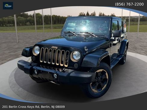 Used 2014 Jeep Wrangler Unlimited Sahara AWD/4WD image 1