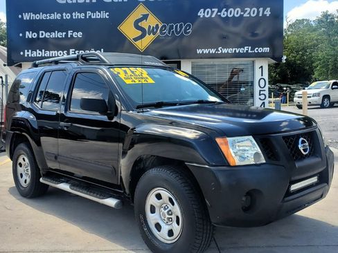 Used 2014 Nissan Xterra X AWD/4WD image 1