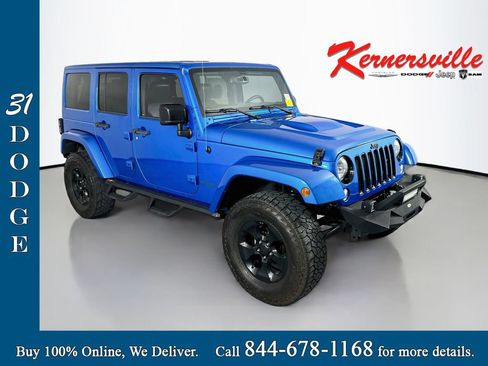Used 2015 Jeep Wrangler Unlimited Sahara AWD/4WD image 1