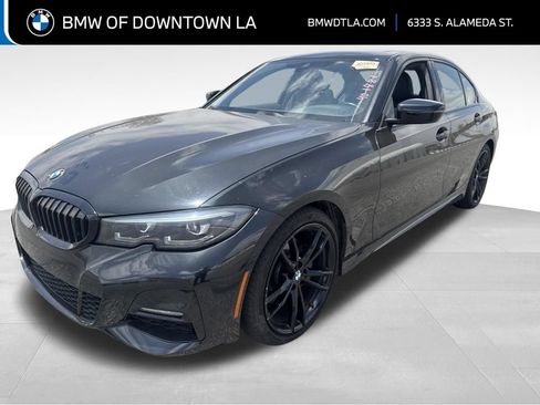 Used 2022 BMW 330i Sedan w/ M Sport Package RWD image 1