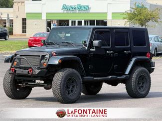 Used 2010 Jeep Wrangler Unlimited Sahara w/ Dual Top Group AWD/4WD video 1