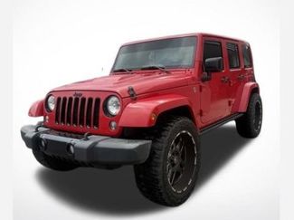 Used 2015 Jeep Wrangler Unlimited Sahara AWD/4WD video 1