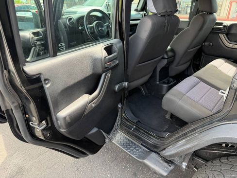 Used 2012 Jeep Wrangler Unlimited Sport w/ Connectivity Group AWD/4WD image 11