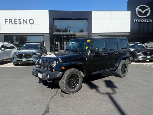 Used 2016 Jeep Wrangler Unlimited Sahara AWD/4WD image 1