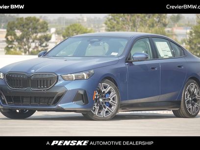 New 2026 BMW 550e xDrive w/ Premium Package