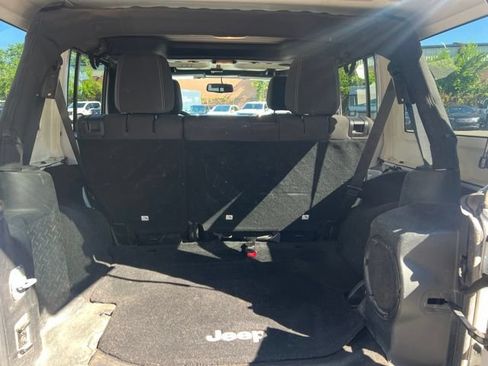 Used 2014 Jeep Wrangler Unlimited Sahara w/ Dual Top Group AWD/4WD image 14