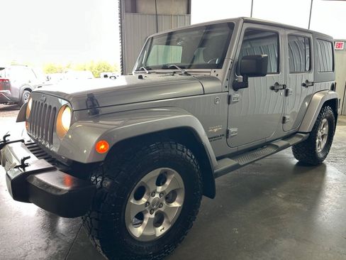 Used 2013 Jeep Wrangler Unlimited Sahara w/ Trailer Tow Group AWD/4WD image 2