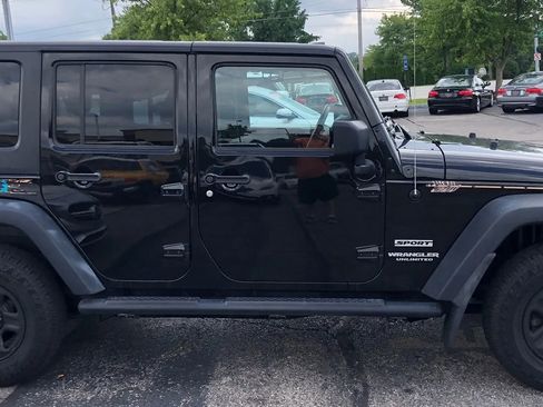 Used 2015 Jeep Wrangler Unlimited Sport w/ Mopar Black Appearance Group image 25