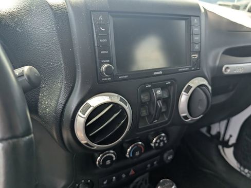 Used 2014 Jeep Wrangler Unlimited Rubicon w/ Dual Top Group AWD/4WD image 14
