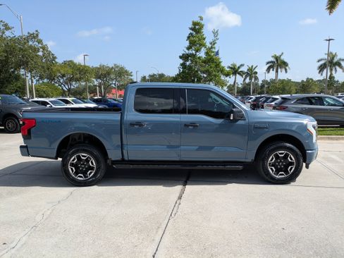 Certified 2023 Ford F150 Lightning XLT w/ Tow Technology Package AWD/4WD image 3