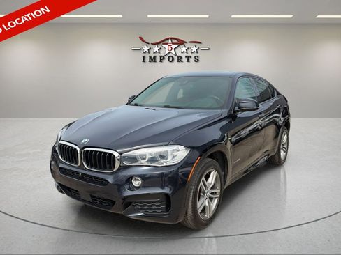 Used 2019 BMW X6 xDrive35i w/ M Sport Package AWD/4WD image 1