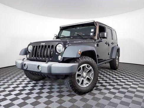 Used 2014 Jeep Wrangler Unlimited Rubicon w/ Dual Top Group AWD/4WD image 2