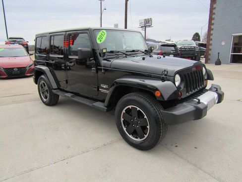 Used 2013 Jeep Wrangler Unlimited Sahara w/ Dual Top Group image 2