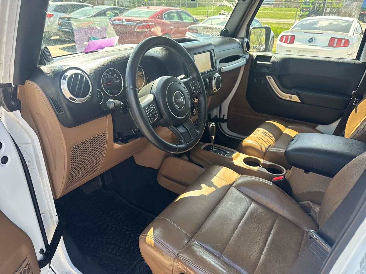 Used 2012 Jeep Wrangler Unlimited Sahara w/ Dual Top Group AWD/4WD image 9