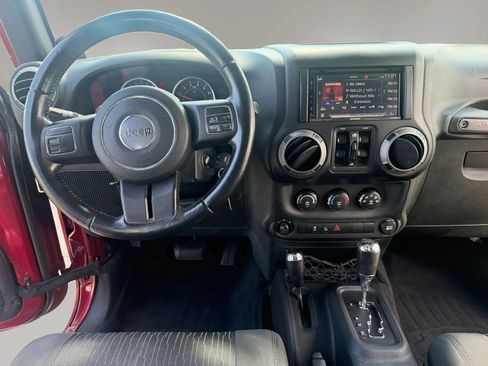 Used 2012 Jeep Wrangler Unlimited Sport AWD/4WD image 9