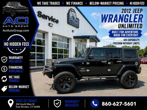 Used 2012 Jeep Wrangler Unlimited Sahara w/ Dual Top Group AWD/4WD image 1