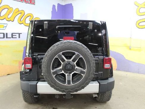 Used 2014 Jeep Wrangler Unlimited Sahara w/ Dual Top Group AWD/4WD image 6