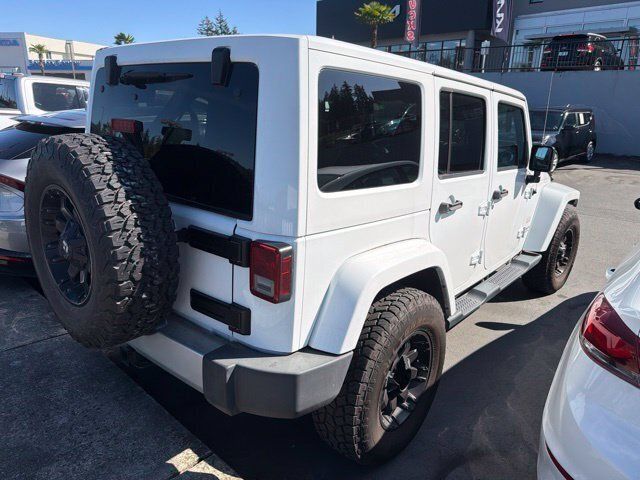 Used 2013 Jeep Wrangler Unlimited Sahara w/ Dual Top Group AWD/4WD image 3
