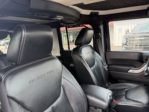 Used 2013 Jeep Wrangler Unlimited Rubicon w/ Dual Top Group AWD/4WD image 21