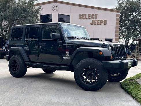 Used 2012 Jeep Wrangler Unlimited Sport image 1