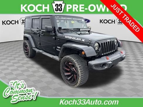 Used 2011 Jeep Wrangler Unlimited Sahara w/ Dual Top Group image 1