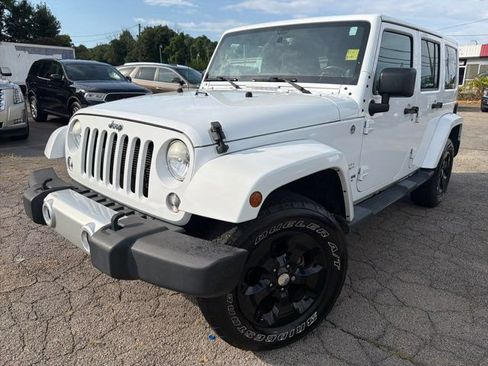 Used 2014 Jeep Wrangler Unlimited Sahara w/ Dual Top Group AWD/4WD image 1