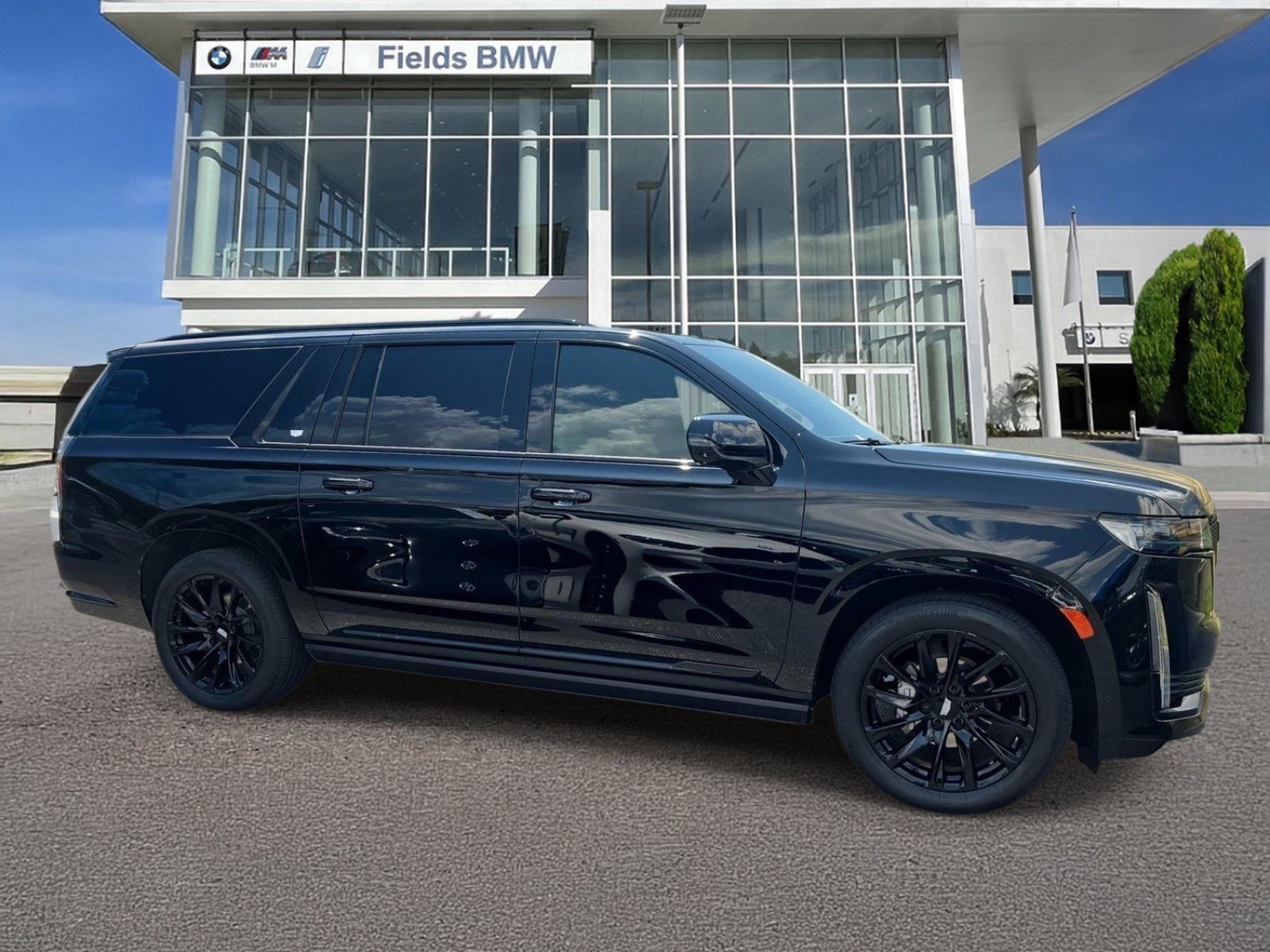 Used 2024 Cadillac Escalade ESV Sport w/ LPO, ONYX Package AWD/4WD image 1