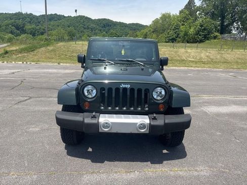 Used 2010 Jeep Wrangler Unlimited Sahara w/ Dual Top Group AWD/4WD image 3