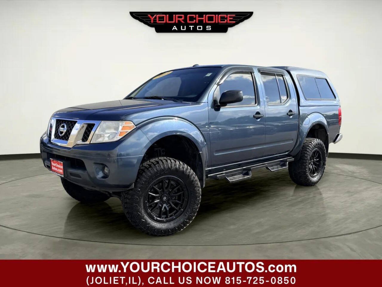 Used 2013 Nissan Frontier SV AWD/4WD image 1