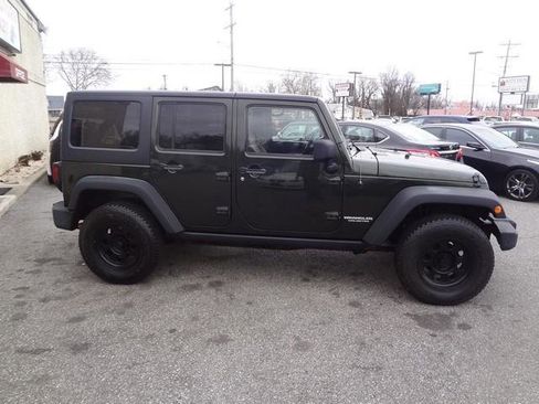 Used 2011 Jeep Wrangler Unlimited Rubicon w/ Dual Top Group image 4