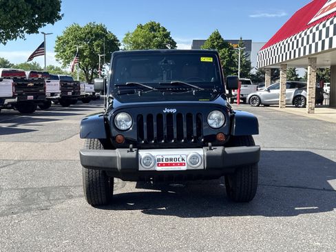 Used 2013 Jeep Wrangler Unlimited Sahara w/ Trailer Tow Group AWD/4WD image 2